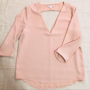 C&E blush pink blouse w/ a cutout at the back